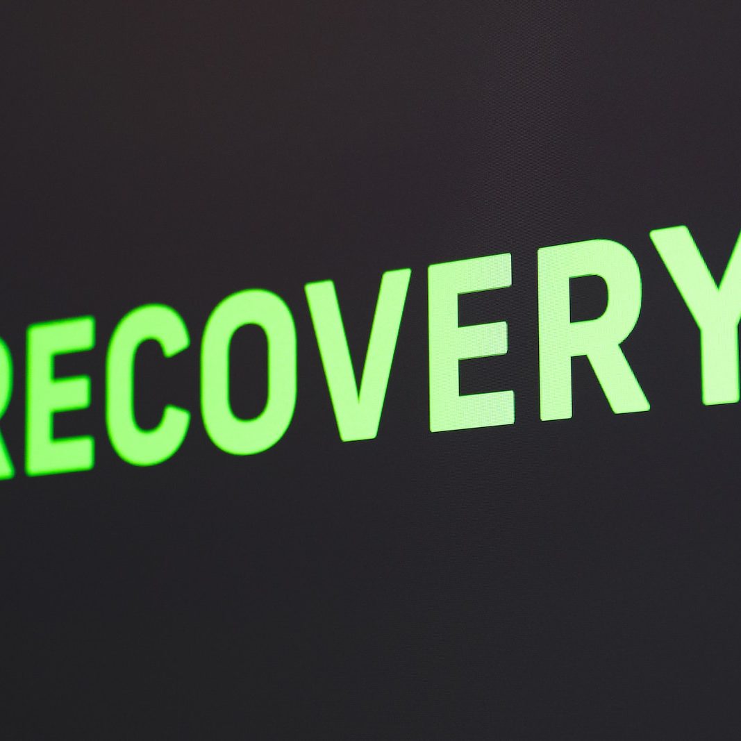 a close up of a sign that reads recovery