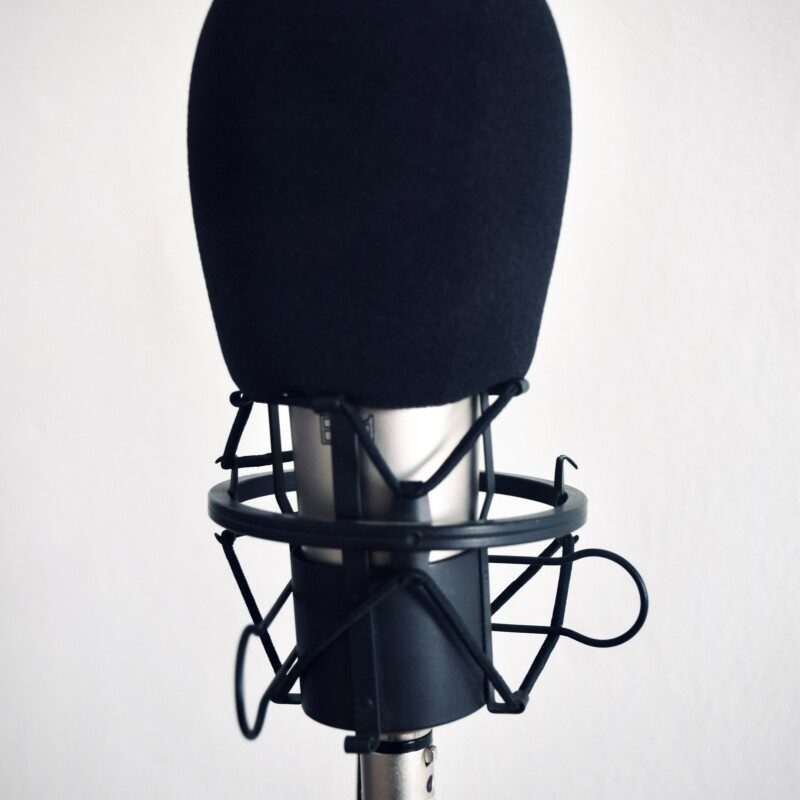 black and silver microphone on black stand