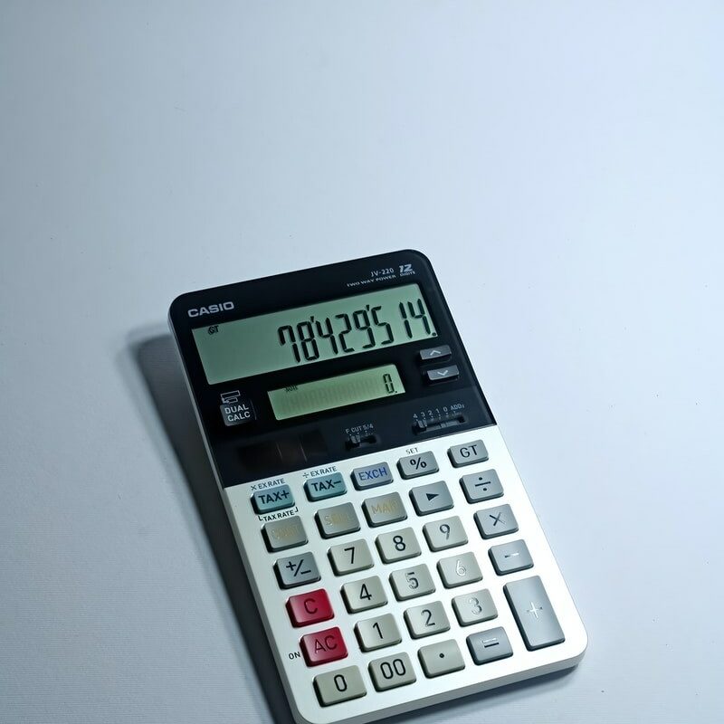white and black canon calculator